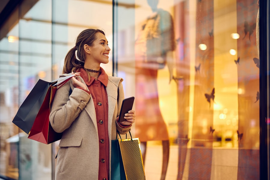 women holding shopping bags